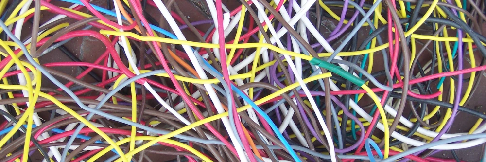 A mess of different cables with various colors.